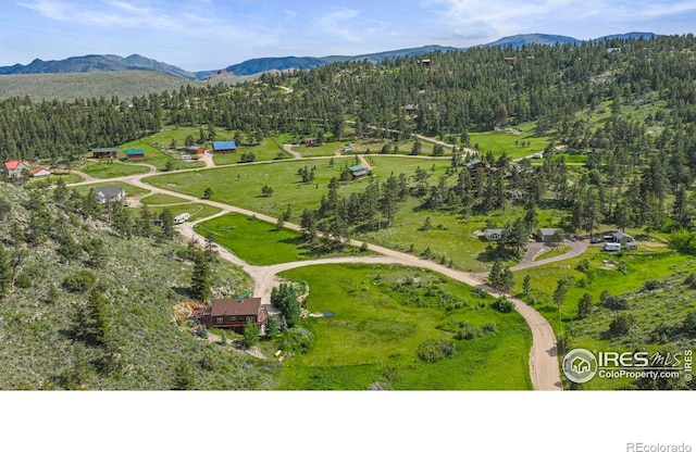 228 Mount Everest Dr, Livermore, CO 80536 - aerial view of a mountain backdrop and a forest