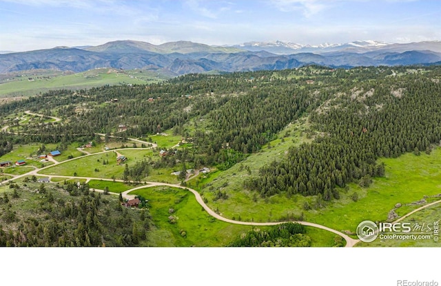 228 Mount Everest Dr, Livermore, CO 80536 - bird's eye view of a heavily wooded area and mountains