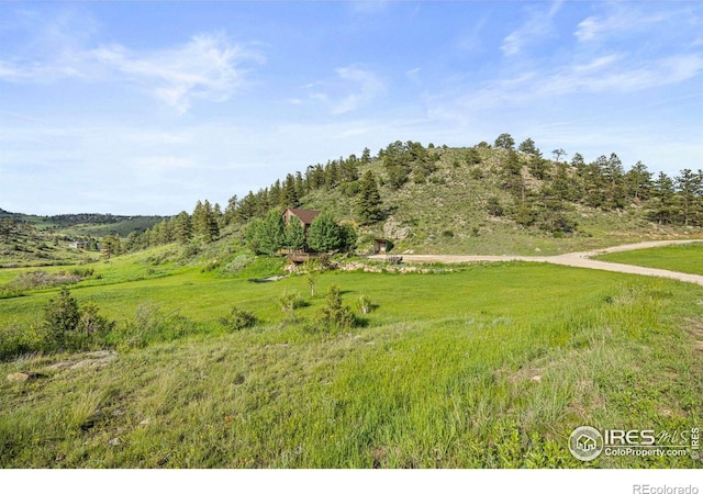 228 Mount Everest Dr, Livermore, CO 80536 - view of mountain backdrop with rural landscape