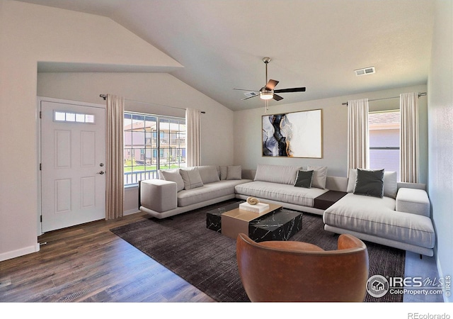 4327 Primrose Ln, Evans, CO 80620 - living room featuring lofted ceiling, wood finished floors, and ceiling fan