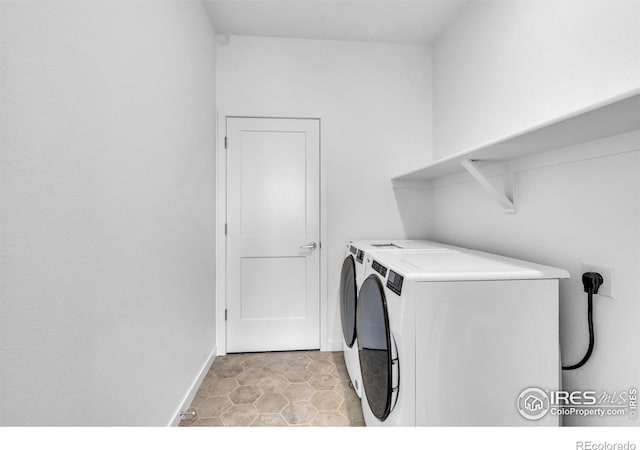 900 Eldorado Ln, Louisville, CO 80027 - laundry area with washing machine and clothes dryer and baseboards