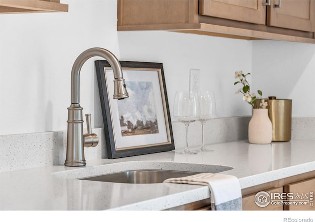 900 Eldorado Ln, Louisville, CO 80027 - kitchen view of a sink and light stone counters