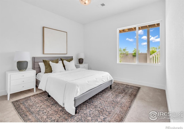 900 Eldorado Ln, Louisville, CO 80027 - carpeted bedroom featuring baseboards