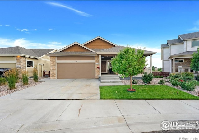 1774 Thrive Dr, Windsor, CO 80550 - craftsman inspired home with driveway, an attached garage, a front lawn, and roof with shingles