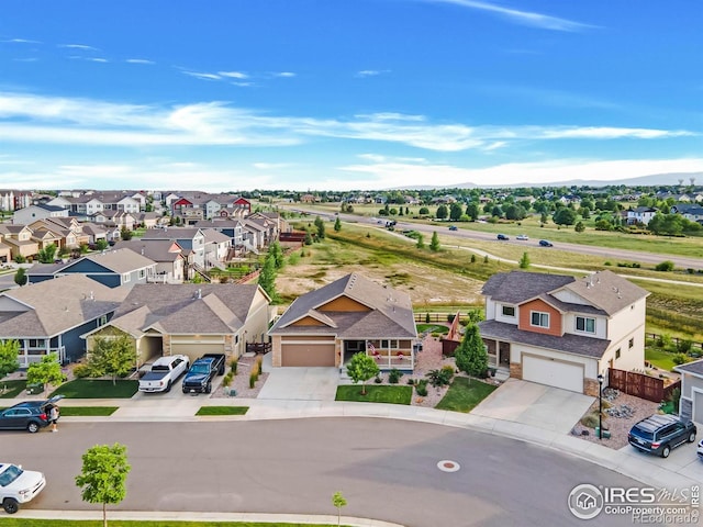 1774 Thrive Dr, Windsor, CO 80550 - aerial view of residential area with a mountainous background