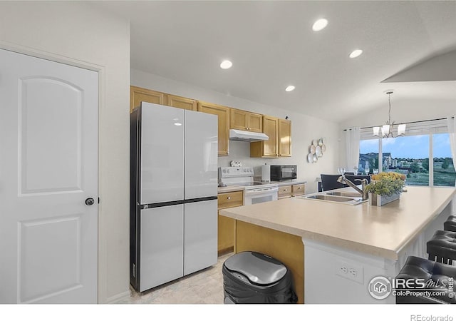 1774 Thrive Dr, Windsor, CO 80550 - kitchen featuring freestanding refrigerator, black microwave, white electric range, lofted ceiling, and a breakfast bar area