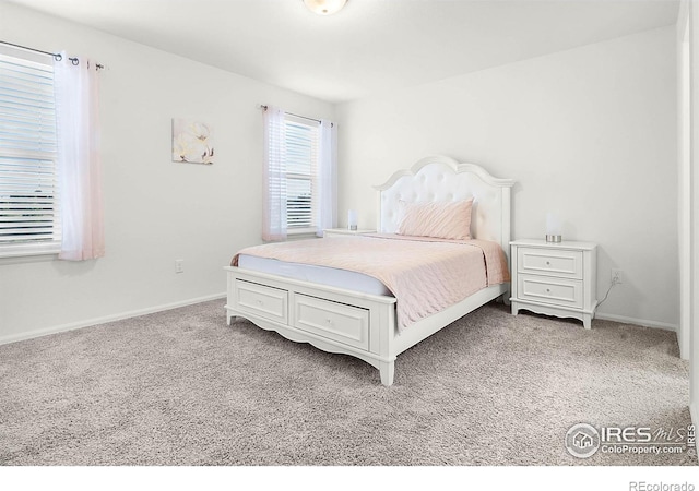 1774 Thrive Dr, Windsor, CO 80550 - bedroom featuring carpet and baseboards