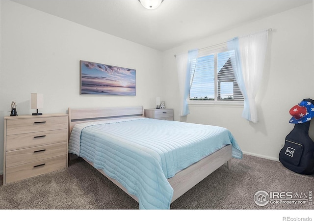 1774 Thrive Dr, Windsor, CO 80550 - bedroom featuring carpet floors and baseboards