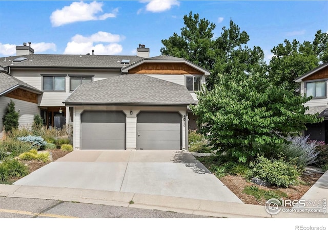 4636 Chestnut Ln, Boulder, CO 80301 - view of front of property featuring an attached garage and concrete driveway