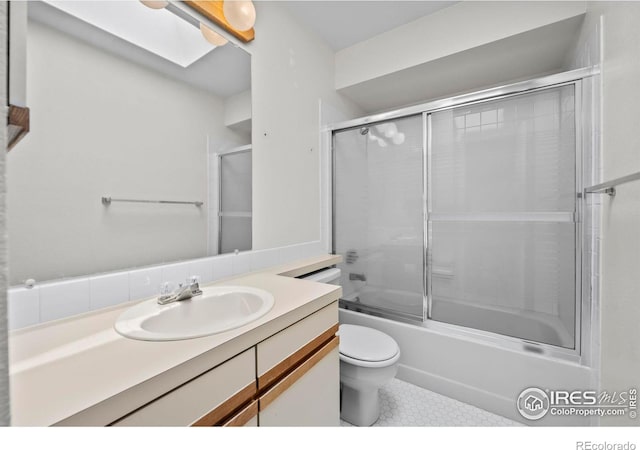 4636 Chestnut Ln, Boulder, CO 80301 - full bath with vanity, bath / shower combo with glass door, a skylight, and tile patterned flooring