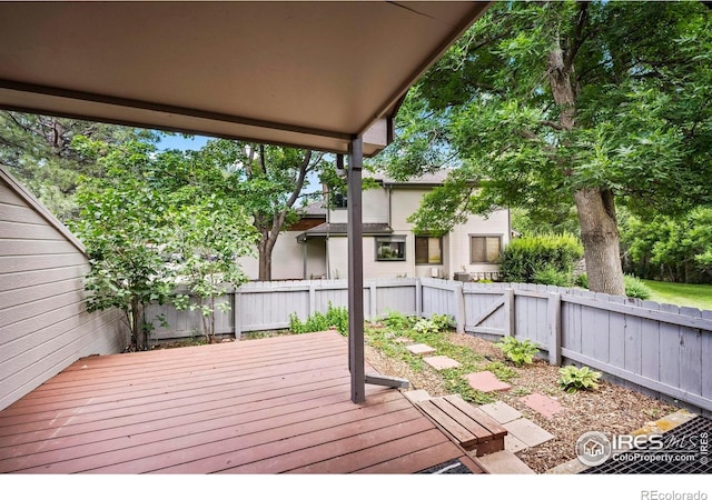 4636 Chestnut Ln, Boulder, CO 80301 - wooden deck featuring a fenced backyard