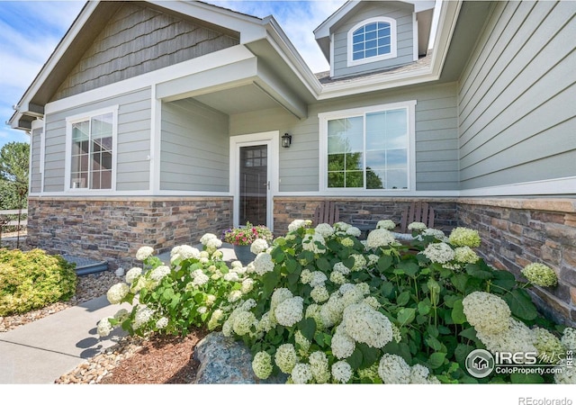 401 Cascade Ct, Johnstown, CO 80534 - doorway to property with stone siding