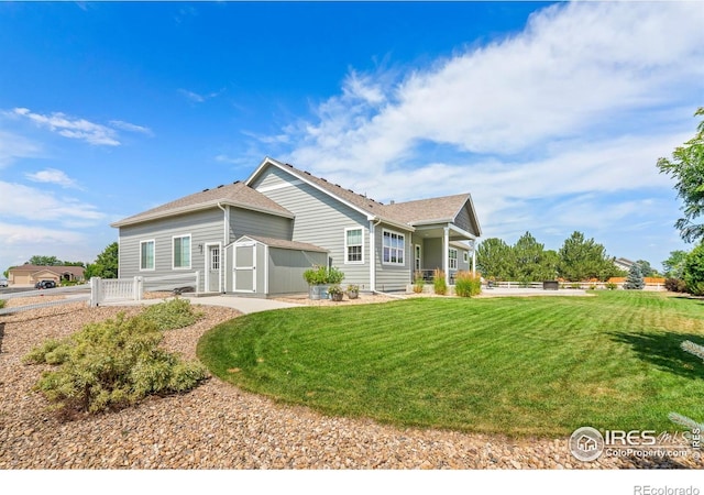 401 Cascade Ct, Johnstown, CO 80534 - view of front of house featuring a storage shed