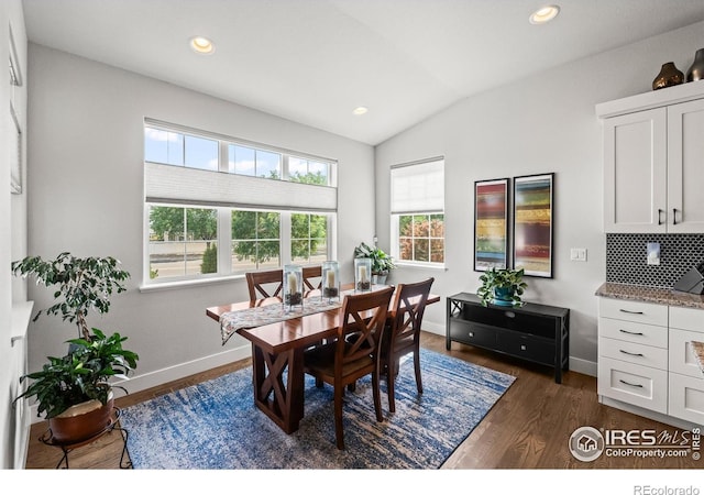 401 Cascade Ct, Johnstown, CO 80534 - dining space with vaulted ceiling, dark wood finished floors, and recessed lighting