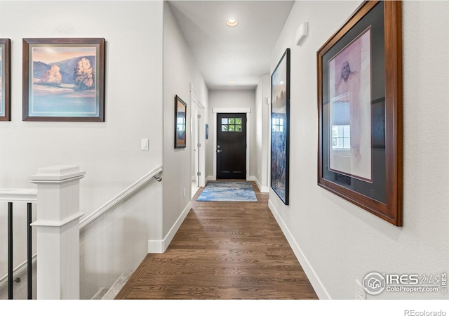 401 Cascade Ct, Johnstown, CO 80534 - doorway to outside featuring wood finished floors and recessed lighting