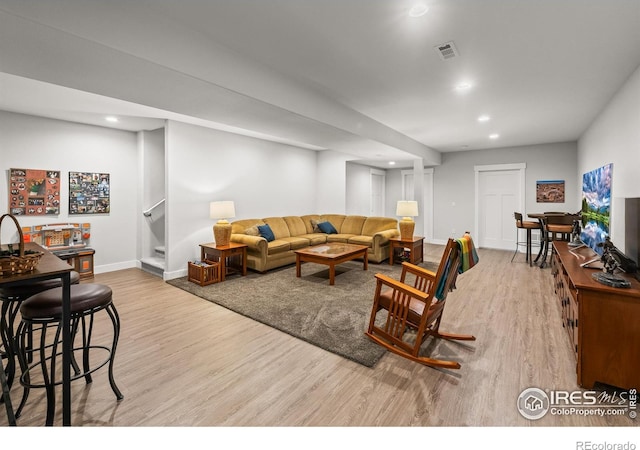 401 Cascade Ct, Johnstown, CO 80534 - living room with wood finished floors, recessed lighting, and stairs