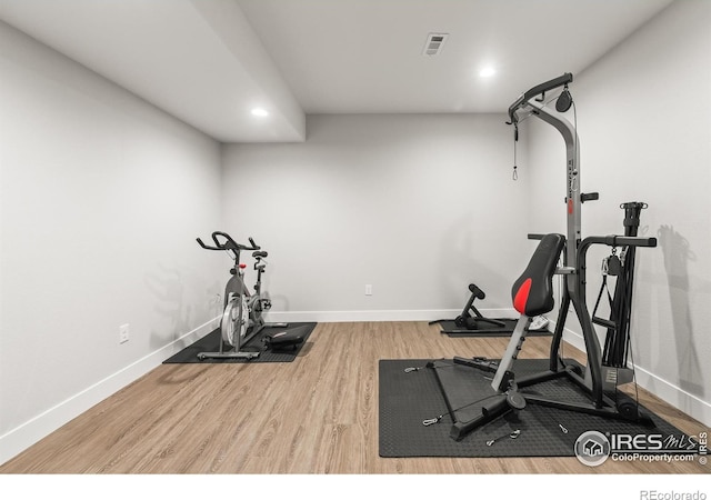 401 Cascade Ct, Johnstown, CO 80534 - workout room with wood finished floors and recessed lighting