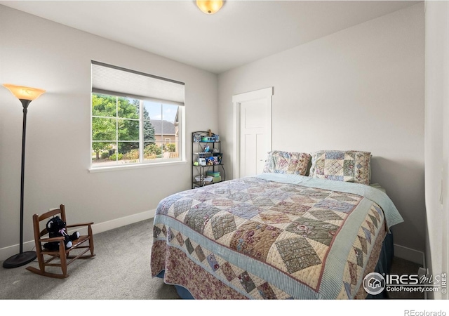 401 Cascade Ct, Johnstown, CO 80534 - carpeted bedroom featuring baseboards