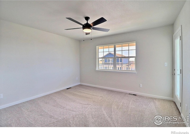 4319 Primrose Ln, Evans, CO 80620 - carpeted empty room featuring a ceiling fan and baseboards