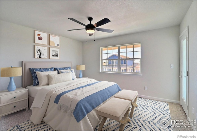 4319 Primrose Ln, Evans, CO 80620 - carpeted bedroom with ceiling fan and baseboards
