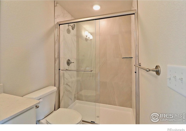 4319 Primrose Ln, Evans, CO 80620 - bathroom with a shower stall and vanity
