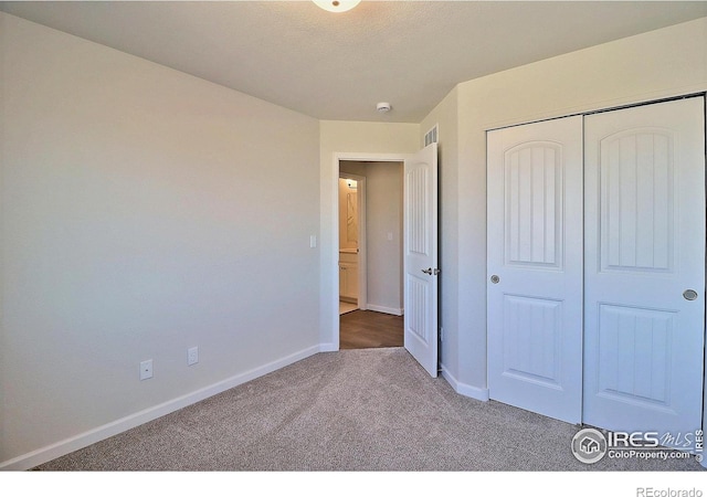 4319 Primrose Ln, Evans, CO 80620 - unfurnished bedroom with carpet floors and a closet