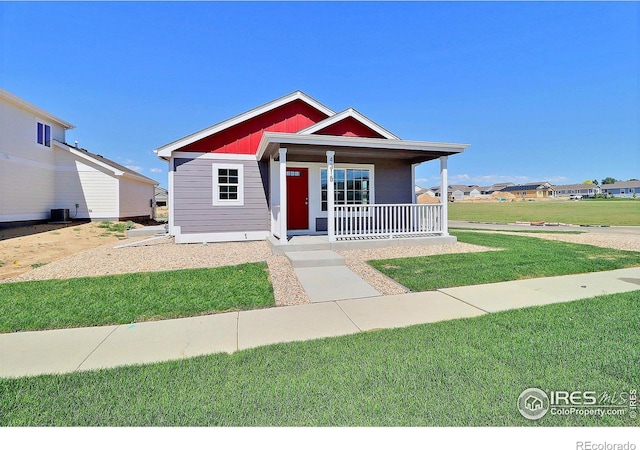 4315 Primrose Ln, Evans, CO 80620 - bungalow-style house with a porch and a front yard
