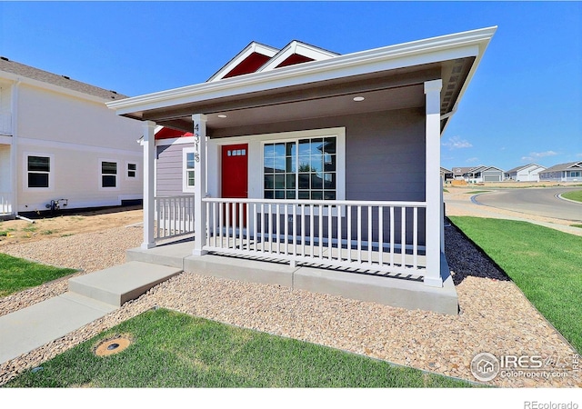 4315 Primrose Ln, Evans, CO 80620 - view of front of property with a porch