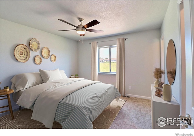 4315 Primrose Ln, Evans, CO 80620 - carpeted bedroom with a ceiling fan and baseboards