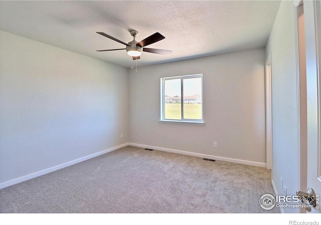 4315 Primrose Ln, Evans, CO 80620 - carpeted empty room featuring a ceiling fan and a textured ceiling