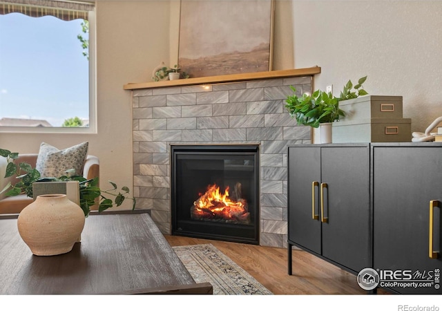 2968 Hydra Dr, Loveland, CO 80537 - detailed view of wood finished floors and a fireplace