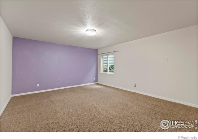2968 Hydra Dr, Loveland, CO 80537 - unfurnished room featuring a textured ceiling and carpet flooring