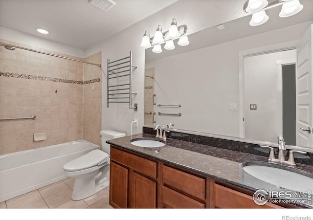 2968 Hydra Dr, Loveland, CO 80537 - bathroom featuring tile patterned floors, double vanity, and tub / shower combination