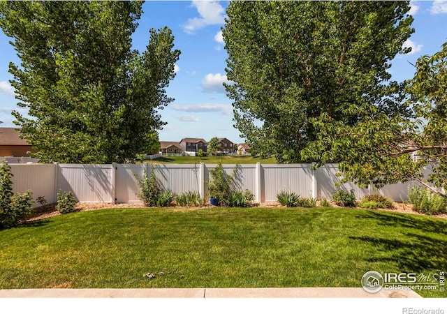 2968 Hydra Dr, Loveland, CO 80537 - fenced backyard featuring a residential view