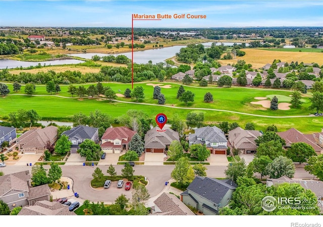 4283 Golf Vista Dr, Loveland, CO 80537 - aerial perspective of suburban area featuring a nearby body of water and a local golf course