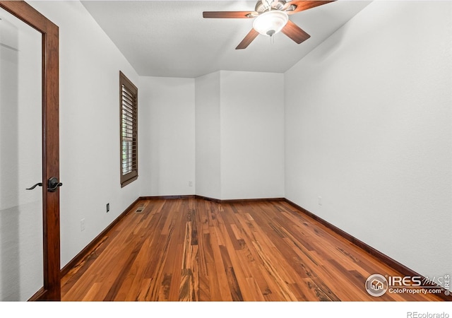 4283 Golf Vista Dr, Loveland, CO 80537 - empty room featuring wood-type flooring and ceiling fan
