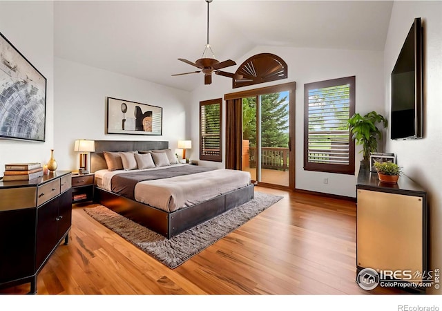 4283 Golf Vista Dr, Loveland, CO 80537 - bedroom featuring access to outside, light wood-type flooring, lofted ceiling, and a ceiling fan