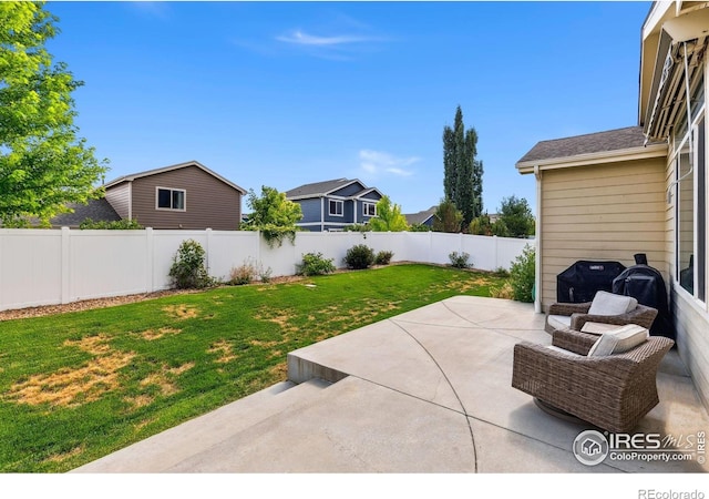 1625 Glacier Ave, Berthoud, CO 80513 - fenced backyard featuring a patio area