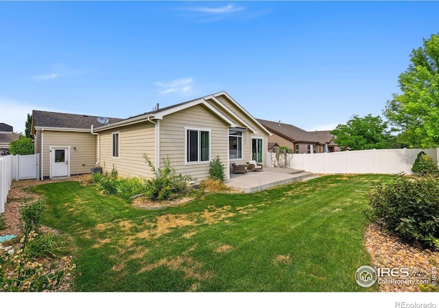 1625 Glacier Ave, Berthoud, CO 80513 - back of house featuring a patio and a fenced backyard