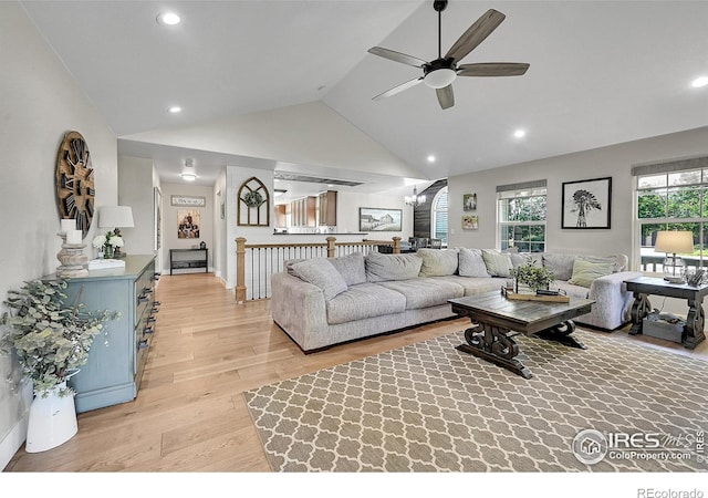 1115 Kestrel Rd, Eaton, CO 80615 - living room with a ceiling fan, light wood-style floors, recessed lighting, high vaulted ceiling, and a chandelier