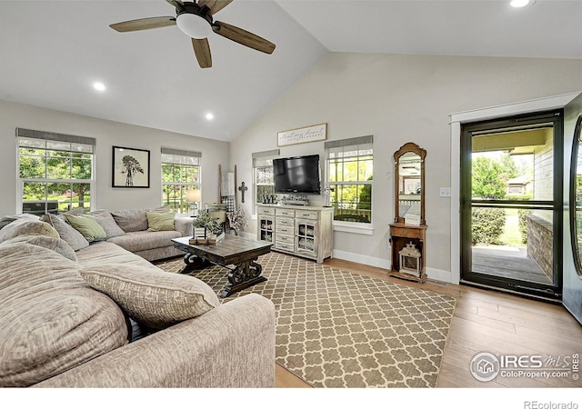 1115 Kestrel Rd, Eaton, CO 80615 - living area with a ceiling fan, light wood-type flooring, high vaulted ceiling, and recessed lighting