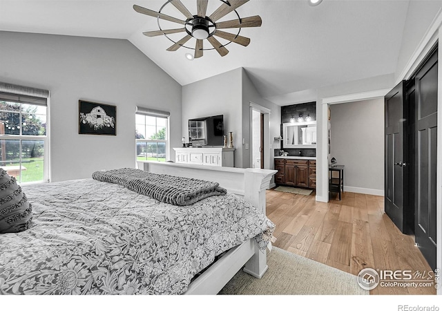 1115 Kestrel Rd, Eaton, CO 80615 - bedroom featuring light wood-type flooring, vaulted ceiling, ensuite bathroom, a ceiling fan, and recessed lighting