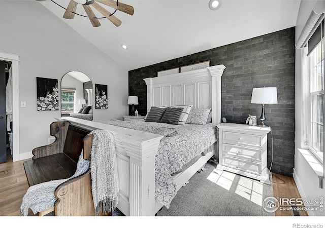 1115 Kestrel Rd, Eaton, CO 80615 - bedroom featuring wood finished floors, recessed lighting, ceiling fan, and high vaulted ceiling