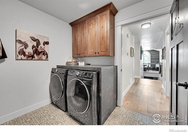 1115 Kestrel Rd, Eaton, CO 80615 - laundry room with washing machine and dryer and cabinet space