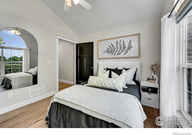 1115 Kestrel Rd, Eaton, CO 80615 - bedroom featuring vaulted ceiling, wood finished floors, and a ceiling fan