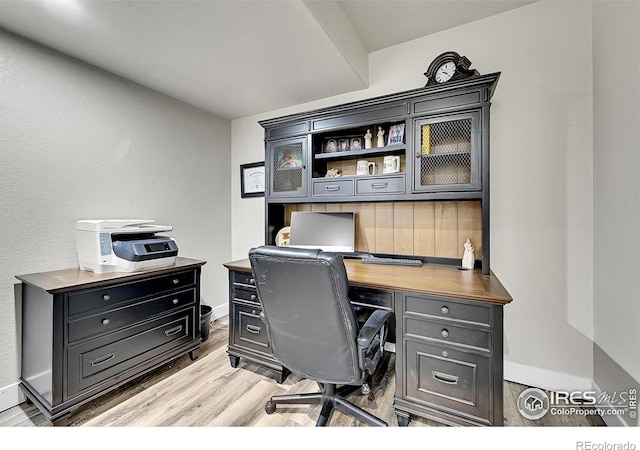 1115 Kestrel Rd, Eaton, CO 80615 - office space with light wood finished floors
