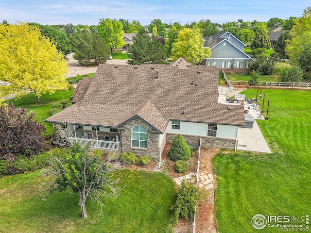 1115 Kestrel Rd, Eaton, CO 80615 - view of front of home with stone siding and a shingled roof
