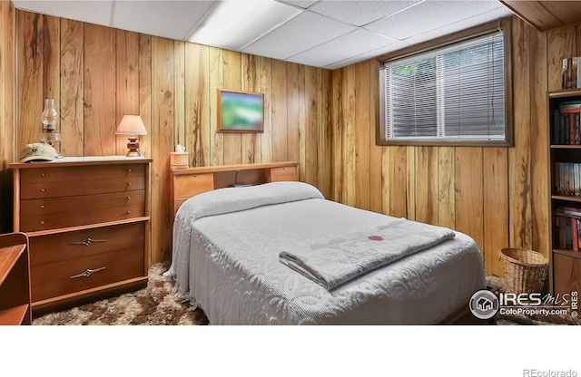 2937 Alamo Ave, Fort Collins, CO 80525 - bedroom with wood walls