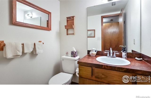 2937 Alamo Ave, Fort Collins, CO 80525 - bathroom with toilet and vanity