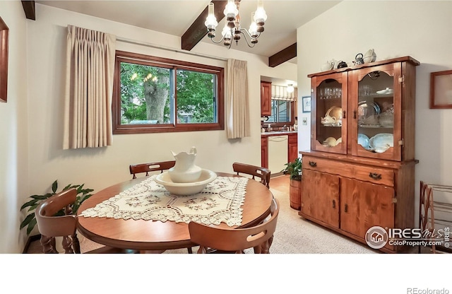 2937 Alamo Ave, Fort Collins, CO 80525 - dining room with a chandelier and beam ceiling